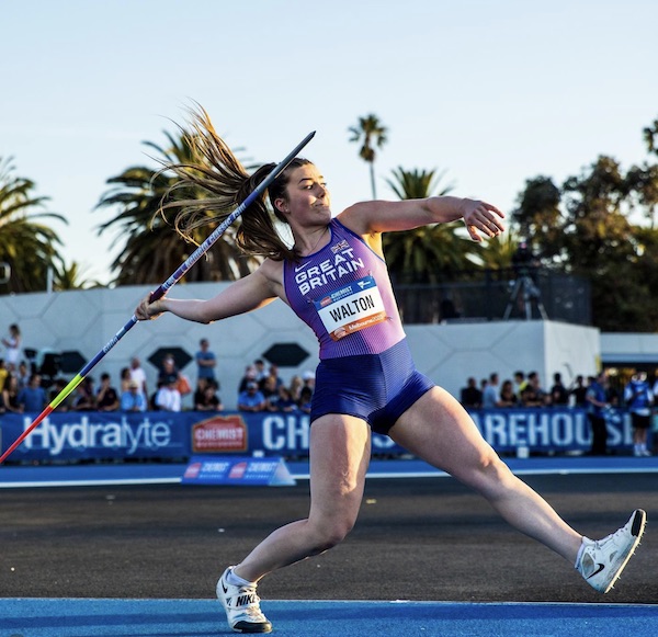 Bekah Walton throwing the javelin in a Great Britain vest